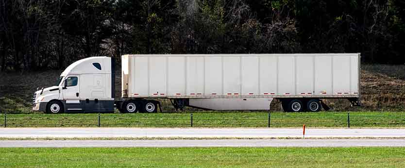 Semi Diesel Truck on the roadside waiting on a repair